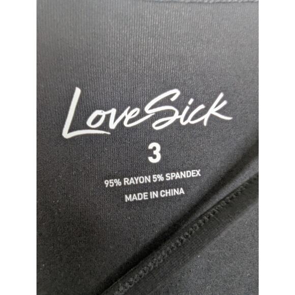 NWT Torrid Lovesick Flame Skull Strappy Long Sleeve Hi-Low Shirt - Picture 7 of 9